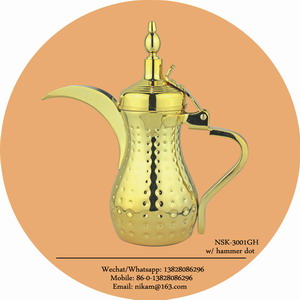 gold coffee pot with hammer dots